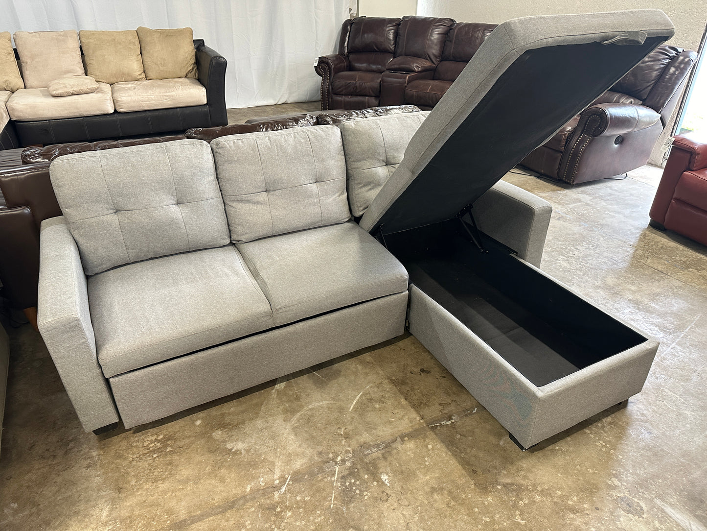 Redwood Home Furniture Amboise Sleeper Sectional with Storage Chaise