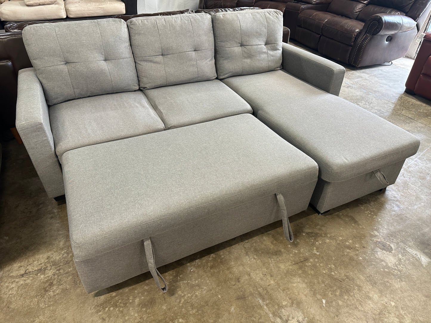 Redwood Home Furniture Amboise Sleeper Sectional with Storage Chaise