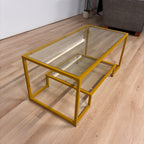 Ebern Designs Gold Trim Glass Coffee Table