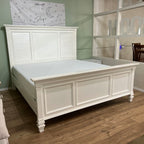 White wood king bed footboard with panel detail