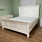 Magnussen Home white king bed with matching footboard, angled view