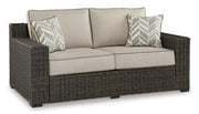 Coastline Bay Outdoor Loveseat with Cushion -  Ashley Furniture Outdoor Seating  Fresh Start Furniture