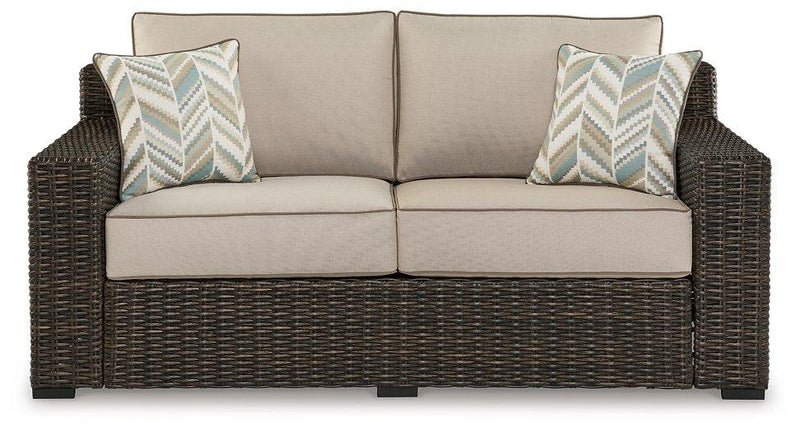 Coastline Bay Outdoor Loveseat with Cushion -  Ashley Furniture Outdoor Seating  Fresh Start Furniture