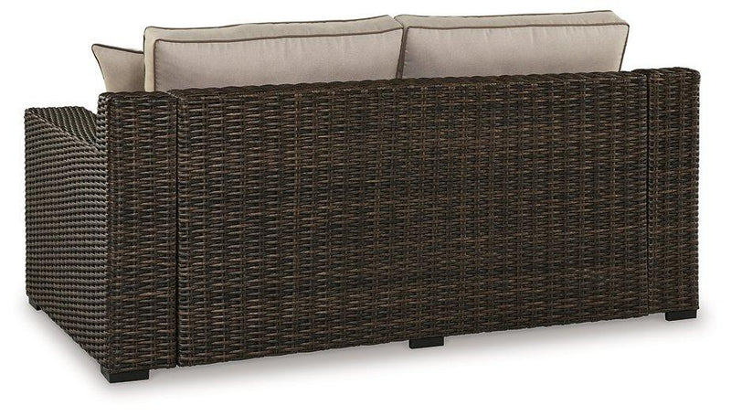 Coastline Bay Outdoor Loveseat with Cushion -  Ashley Furniture Outdoor Seating  Fresh Start Furniture