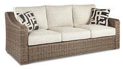 Beachcroft Beachcroft Nuvella Sofa with Coffee and End Table -  Ashley Furniture Outdoor Table Set